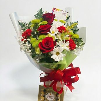 FLEUR DE ROUX - Birthday bouquet asked AI to cover my background but bouquet and chocolates were work done by Angelica. - Florists Near Me - Alhambra, California