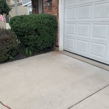 Magic Stone General Contracting - The other side of the garage, where they removed bricks - Masonry/Concrete Near Me - Grand Island, New York
