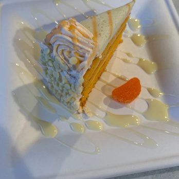 Flagler Beachfront Winery - Florida orange and white choc. Layered cake - Wineries Near Me - Flagler Beach, Florida