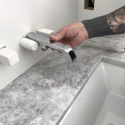 The faucets don't reach to drain into the sinks!