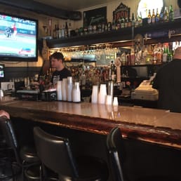a man sitting at a bar