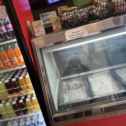 Crawfish Shack Seafood - The beverage cooler and where they have some of their fresh fish