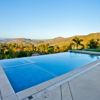 Distinguished Pools - forever views.  Designed by Dan Ramos - Pool & Hot Tub Service Near Me - Poway, California