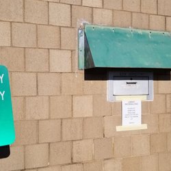 Coventry Public Library - Book drop at corner of building, away from entrance.