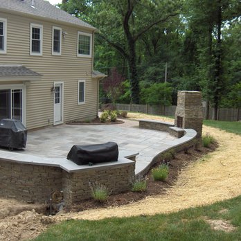 Branstone Landscapes - a patio with a fire pit - Landscaping Near Me Branstone Landscapes - a patio with a fire pit - Landscaping Near Me