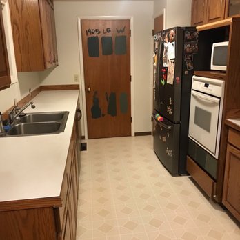 Moir Construction - Kitchen before- door swings open into the kitchen making it hard to open the fridge and pantry door - General Contractors Near Me - Eugene, Oregon