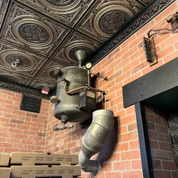 a brick wall with a pizza oven a brick wall with a pizza oven