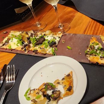 Seasons 52 - Happy hour special mushroom flatbread *all varieties are delicious, And *a glass of wine, all for just $13 - New American Near Me - Palm Beach Gardens, Florida Seasons 52 - Happy hour special mushroom flatbread *all varieties are delicious, And *a glass of wine, all for just $13 - New American Near Me - Palm Beach Gardens, Florida
