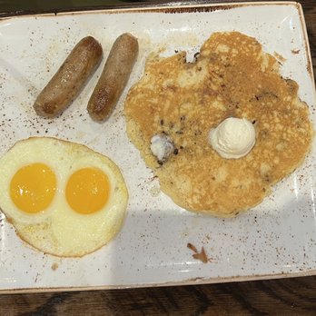First Watch - Sunny side up eggs, sausage, and chocolate chip pancake - Breakfast & Brunch Near Me - Champions Gate, Florida First Watch - Sunny side up eggs, sausage, and chocolate chip pancake - Breakfast & Brunch Near Me - Champions Gate, Florida