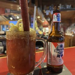 Rusty's Backwater Saloon - Famous Bloody Mary with local cheese and beef stick.