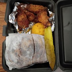 Detroit Corned Beef - Lemon pepper wings Pastrami on rye with Swiss, sauerkraut and motor city sauce. And a pickle spear.