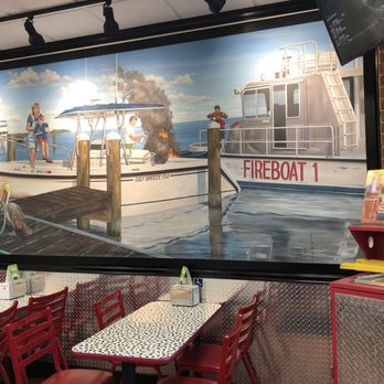 Firehouse Subs - a painting of a fire boat - Sandwiches Near Me - Gulf Breeze, Florida Firehouse Subs - a painting of a fire boat - Sandwiches Near Me - Gulf Breeze, Florida