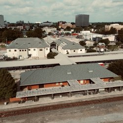 Lafayette Amtrak Station - Amtrak LFT @ Lafayette LA Transportation Center.  Downtown Lafayette in background.