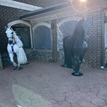 Lopez Grill - Front entrance with Black and White Stallions ( horses )... - Mexican Near Me - Bartlett, Tennessee