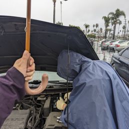 Going the extra mile and replacing my battery despite the drizzling weather. Going the extra mile and replacing my battery despite the drizzling weather.