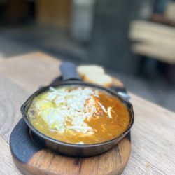 Ojo de Agua - Baked eggs with red and green sauces