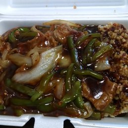 Pepper Steak w/ Onions, Spicy, over Brown Rice.