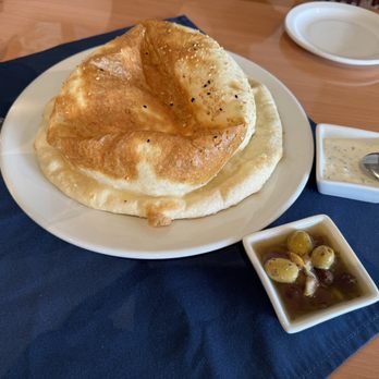 Sevin Mediterranean Kitchen - Turkish Bread with Tzatziki and olives - Turkish Near Me - San Antonio, Texas Sevin Mediterranean Kitchen - Turkish Bread with Tzatziki and olives - Turkish Near Me - San Antonio, Texas