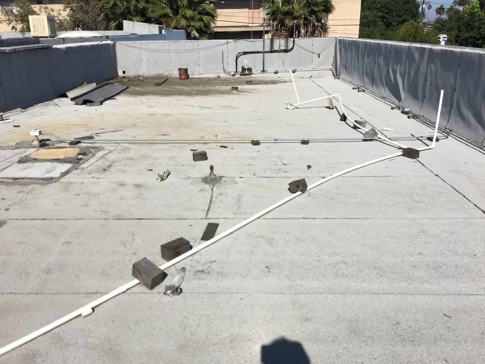 Slide of Espino Roofing