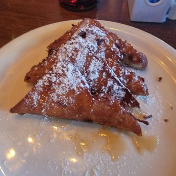 Rivets American Grill - Brioche French toast with powered sugar and caramel maple syrup - Bars Near Me - Modesto, California Rivets American Grill - Brioche French toast with powered sugar and caramel maple syrup - Bars Near Me - Modesto, California