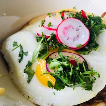 The Guest House - Marscarpone polenta with braised pork radishes and sunny side side up eggs - American Near Me - Kenmore, Washington The Guest House - Marscarpone polenta with braised pork radishes and sunny side side up eggs - American Near Me - Kenmore, Washington