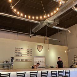 Goldfinger Brewing Company - Spacious and very bright colored taproom.
