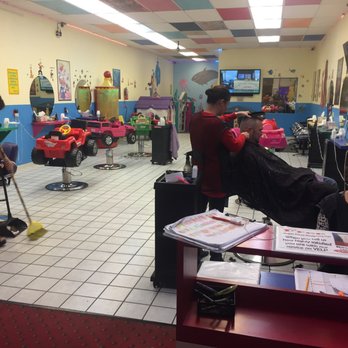 Kinder Cuts - From the front. You can see the tv and fun cars shaped chairs. They also have normal chairs and boosters. - Hair Salons Near Me - San Jose, California Kinder Cuts - From the front. You can see the tv and fun cars shaped chairs. They also have normal chairs and boosters. - Hair Salons Near Me - San Jose, California