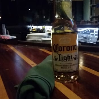 Fini's Landing - Corona Light and a boat - shaped bar! - New American Near Me - Tucson, Arizona Fini's Landing - Corona Light and a boat - shaped bar! - New American Near Me - Tucson, Arizona