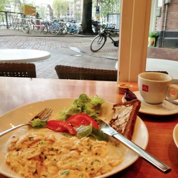Puccini - Scrambled eggs with toast and coffee, with a view towards the canal. - Coffee & Tea Near Me - Amsterdam, New Hampshire