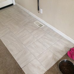 hoagland tile - Entry Way. Replaced awful tiles with lighter more modern.