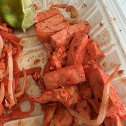 V1.) Pad Thai  Uncooked tofu thrown in the mix