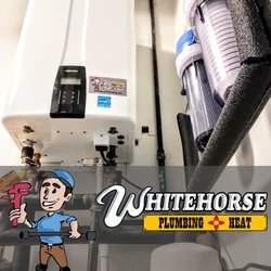 Whitehorse Plumbing - Tankless Water Heater with whole house filters.