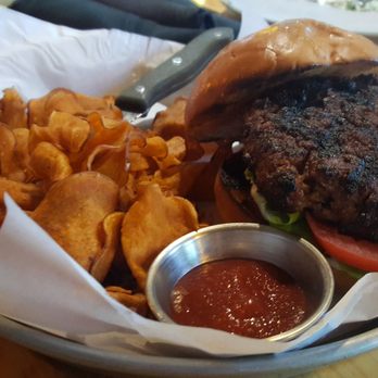 Manito Tap House - Grand beef burger- 6 oz. Gebber Farm beef burger topped with choice cheese, mayo, tomato, and lettuce - American Near Me - Spokane, Washington Manito Tap House - Grand beef burger- 6 oz. Gebber Farm beef burger topped with choice cheese, mayo, tomato, and lettuce - American Near Me - Spokane, Washington