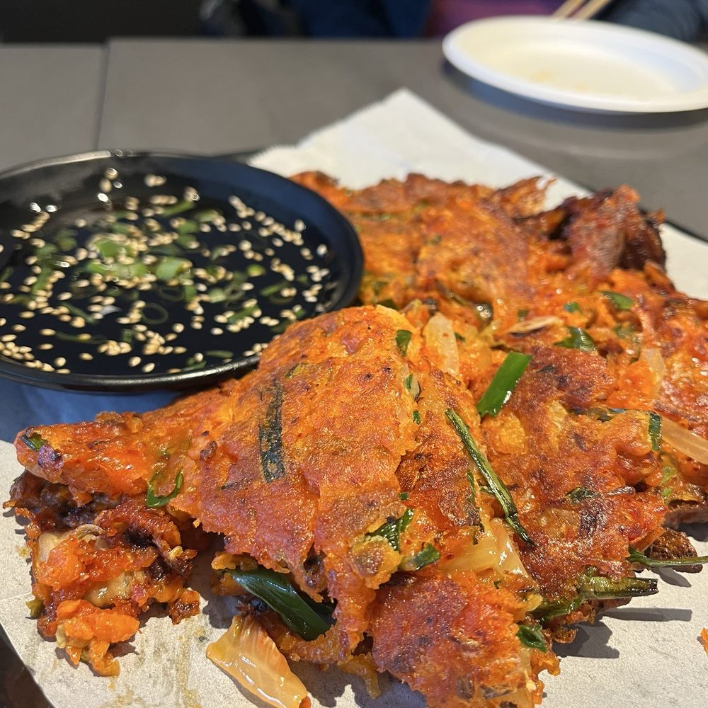Cafe Moon - This Jeon (savory fried pancake) and the dipping sauce is 10/10, no notes, simply a plate of "yes please". - Korean Near Me - Kihei, Hawaii Cafe Moon - This Jeon (savory fried pancake) and the dipping sauce is 10/10, no notes, simply a plate of "yes please". - Korean Near Me - Kihei, Hawaii