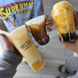 Mango pomelo sago, brown sugar milk tea & mango slush with fresh mango & boba.