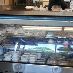 Seasoned Pitmasters - An assortment of sides... sauce... and tasty sweets in the cooler.