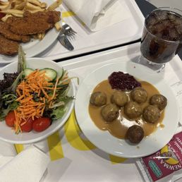 Garden salad (left), 2 side orders of Swedish meatballs (right), chicken tenders (back left) Garden salad (left), 2 side orders of Swedish meatballs (right), chicken tenders (back left)