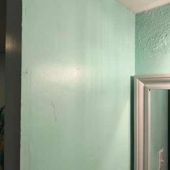 Fairway Villas - Mysterious red goo stuff running down the wall. - Hotels Near Me - Corpus Christi, Texas