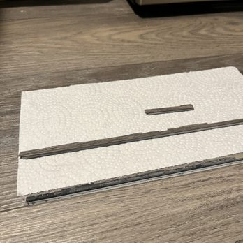 Pelican Creations - large section of the side of a floor plank broken off - Flooring Near Me - Mississauga, Ontario Pelican Creations - large section of the side of a floor plank broken off - Flooring Near Me - Mississauga, Ontario