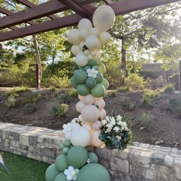 Custom balloon garland with fresh flower bouquet Custom balloon garland with fresh flower bouquet