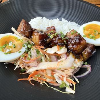Posana - Braised Pork Belly Thit Kho sticky rice, soft egg, raw vegetable salad, nuóc châm - New American Near Me - Asheville, North Carolina Posana - Braised Pork Belly Thit Kho sticky rice, soft egg, raw vegetable salad, nuóc châm - New American Near Me - Asheville, North Carolina
