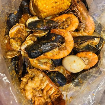 Cajun Bay Seafood & Bar - Shrimp,clams,lobster tail,egg,corn,mussels - Seafood Near Me - Forney, Texas Cajun Bay Seafood & Bar - Shrimp,clams,lobster tail,egg,corn,mussels - Seafood Near Me - Forney, Texas