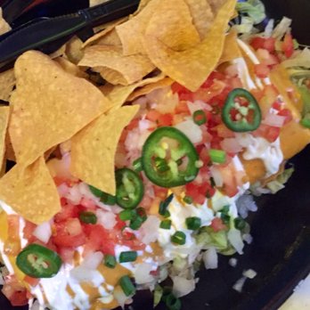 Tijuana Flats - Beef chimichanga with queso added. Pretty tasty. - Mexican Near Me - Lake Mary, Florida