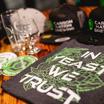 Carbon Nation Brewing - t - shirts and beer glasses on a table - Breweries Near Me - Riverside, California Carbon Nation Brewing - t - shirts and beer glasses on a table - Breweries Near Me - Riverside, California
