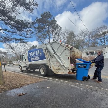 Coastal Waste Management - Out on the weekly trash route in Barnstable, MA, one of our team members is providing dependable curbside trash pickup service. - Dumpster Rental Near Me Coastal Waste Management - Out on the weekly trash route in Barnstable, MA, one of our team members is providing dependable curbside trash pickup service. - Dumpster Rental Near Me