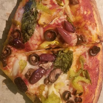 Blaze Pizza - High rise dough, vegan cheese, artichokes, mushrooms, olives, basil, green pepper, banana pepper and oregano sprinkled on top. Delicious!!! - Salad Near Me - Davie, Florida