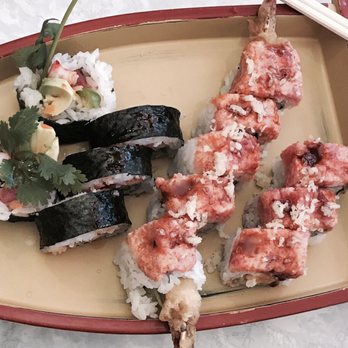 Sushi Kame - Dragon Roll and Love Love Roll. Very good, has a little kick to it. - Sushi Bars Near Me - Champaign, Illinois Sushi Kame - Dragon Roll and Love Love Roll. Very good, has a little kick to it. - Sushi Bars Near Me - Champaign, Illinois