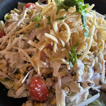 Jalisco Cantina - ESQUITES (a roasted corn salad with cotija cheese, tortilla strips, tomatoes, jicama, red onion, chile-lime dressing and cilantro) - Mexican Near Me - Carlsbad, California