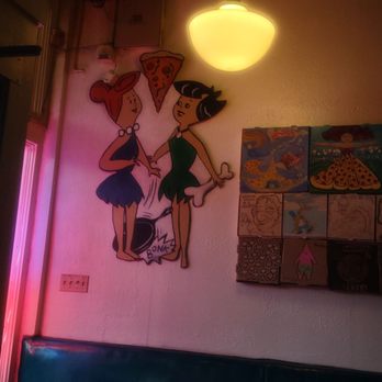 Original Dream Pizza - a couple of people on the wall - Pizza Near Me - Portland, Oregon Original Dream Pizza - a couple of people on the wall - Pizza Near Me - Portland, Oregon