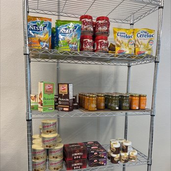 Delish - a shelf of food and condiments - Convenience Stores Near Me - Arden, North Carolina